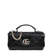 This is a Gucci GG Milano mini top handle bag