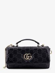 This is a Gucci GG Milano mini top handle bag